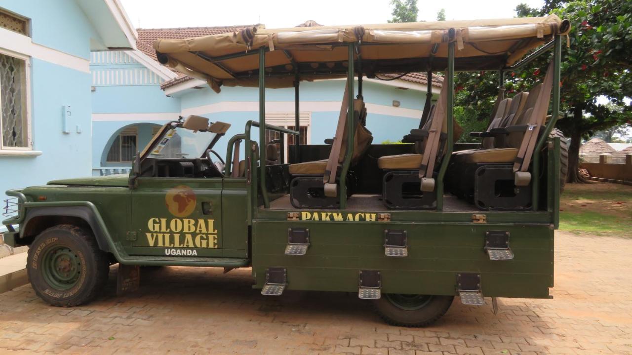 Global Village Hotel Pakwach Extérieur photo